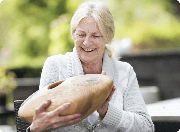 elderly person holding CRDL