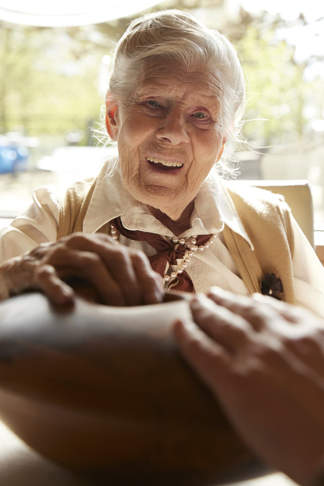 elderly person holding CRDL